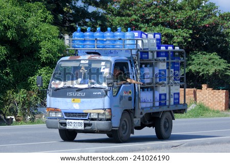 CHIANGMAI, THAILAND -OCTOBER 25 2014:  Drinking water delivery truck of Glacier company. Photo at road no.121 about 8 km from downtown Chiangmai, thailand.