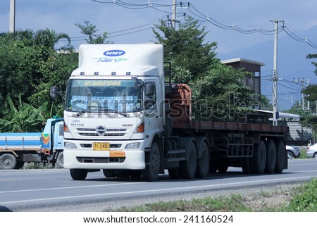CHIANGMAI, THAILAND -OCTOBER 25 2014: Trailer Truck of MMT Logistic transport company. Photo at road no.121 about 8 km from downtown Chiangmai, thailand.