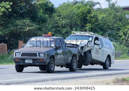 CHIANGMAI, THAILAND - OCTOBER 31 2014:   NMS Tow truck for emergency car move. Photo at road no 121 about 8 km from downtown Chiangmai, thailand.