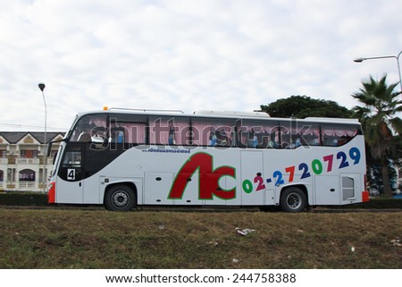 CHIANGMAI, THAILAND - DECEMBER  3 2014: School bus of Cherdchai transport company. Photo at road no.121 about 8 km from downtown Chiangmai, thailand.