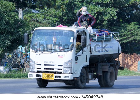CHIANGMAI, THAILAND - DECEMBER  8 2014:  Sewage truck of Navin Jaruen Yorn Transport. Photo at road no.121 about 8 km from downtown Chiangmai, thailand.