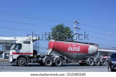 CHIANG MAI, THAILAND - DECEMBER  25 2014:  Cement truck of Nhureboon company. Photo at road no.1001 about 8 km from city center, thailand.