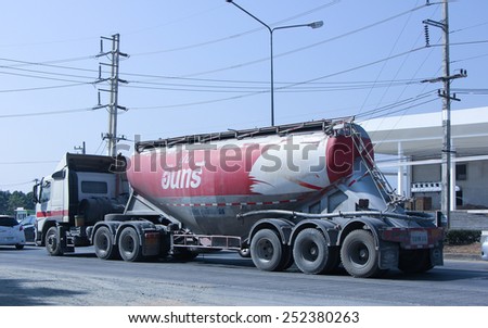 CHIANG MAI, THAILAND - DECEMBER  25 2014:  Cement truck of Nhureboon company. Photo at road no.1001 about 8 km from city center, thailand.