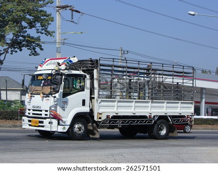 CHIANG MAI, THAILAND - JANUARY  5 2015:  Private truck. Photo at road no.1001 about 8 km from downtown Chiangmai, thailand.