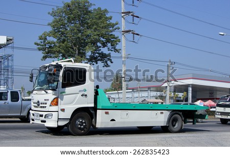 CHIANG MAI, THAILAND - MARCH 5 2015:  Private Slide up tow truck for emergency car move. Photo at road no.1001 about 8 km from downtown Chiangmai, thailand.