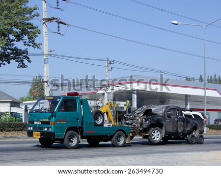 CHIANG MAI, THAILAND - JANUARY  6 2015: SayThong Tow truck for emergency car move. Photo at road no 1001 about 8 km from downtown Chiangmai, thailand.