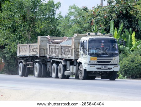 CHIANGMAI , THAILAND -JUNE 3 2015:  Trailer dump truck of CCP company. Photo at road no 121 about 8 km from downtown Chiangmai, thailand.