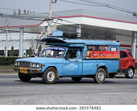 CHIANGMAI , THAILAND -FEBRUARY  6 2015:   Old Blue mini truck taxi, Service between Lamphun and Pasang. Photo at road no.121 about 8 km from downtown Chiangmai, thailand.