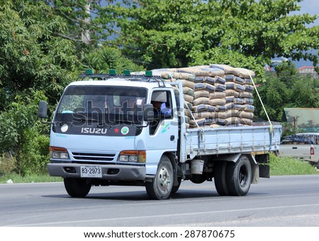 CHIANGMAI, THAILAND -JUNE 8 2015:  Cement truck of Insee Cement company. Photo at road no 121 about 8 km from downtown Chiangmai, thailand.