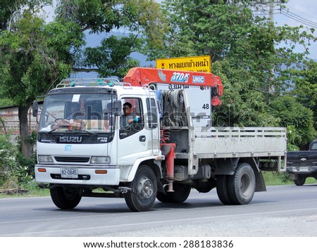 CHIANGMAI , THAILAND -JUNE 8 2015:  Truck with crane of Home Company. Photo at road no.121 about 8 km from downtown Chiangmai, thailand.