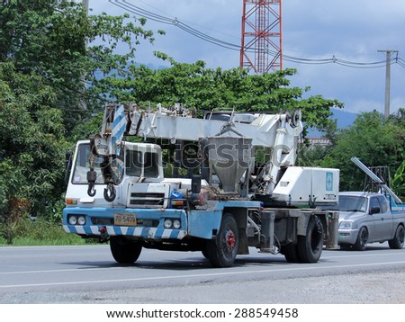 CHIANGMAI, THAILAND -JUNE 16 2015: Private KATO Crane Truck.  Photo at road no 121 about 8 km from downtown Chiangmai, thailand.