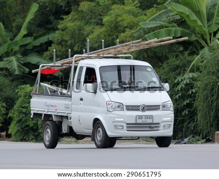 CHIANGMAI, THAILAND -JUNE 25 2015:  Pickup truck of True company. Intenet Service in Thailand. Photo at road no 121 about 8 km from downtown Chiangmai, thailand.