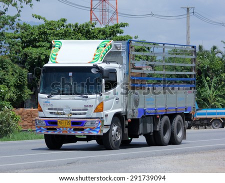CHIANGMAI, THAILAND -JUNE 29 2015: Cargo truck of Amnuay Transport Company. Photo at road no.121 about 8 km from downtown Chiangmai, thailand.