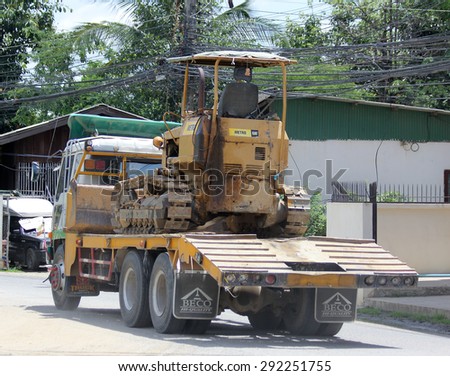CHIANGMAI , THAILAND -JUNE 29 2015: Truck and backhoe of Norst Star Group. Photo at road no.121 about 8 km from downtown Chiangmai, thailand.