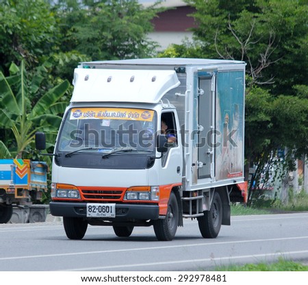 CHIANGMAI , THAILAND -JUNE 30 2015: Refrigerated container mini truck of PNK milk product. Photo at road no 121 about 8 km from downtown Chiangmai, thailand.