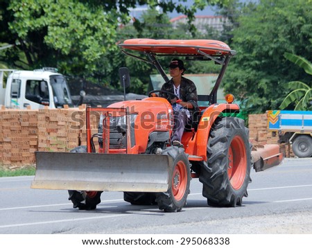 CHIANGMAI, THAILAND -JULY 2 2015: Private Kubota Tractor, Kubota Product made in thailand. Photo at road no.121 about 8 km from downtown Chiangmai, thailand.