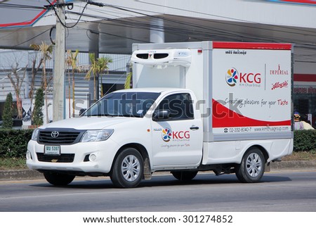 CHIANGMAI , THAILAND -FEBRUARY  6 2015 :  Container Pick up truck of KCG Kim Chua Group. Photo at road no 1001 about 8 km from downtown Chiangmai, thailand.
