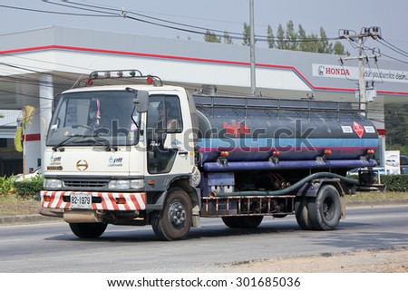 CHIANGMAI , THAILAND -FEBRUARY 6 2015:  PTT Oil Truck of Sukhum Oil transport Company. Photo at road no 1001 about 8 km from downtown Chiangmai, thailand.