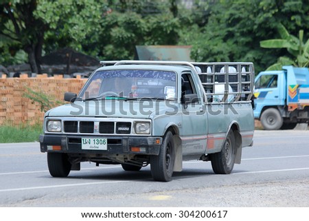 CHIANGMAI , THAILAND - AUGUST 6 2015:  Drinking water delivery Pickup truck of Sahagorn company. Photo at road no.121 about 8 km from downtown Chiangmai, thailand.