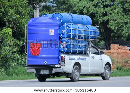 CHIANGMAI, THAILAND -AUGUST 8 2015: Private Pick up car for Water Tank Transportation. Photo at road no 121 about 8 km from downtown Chiangmai, thailand.
