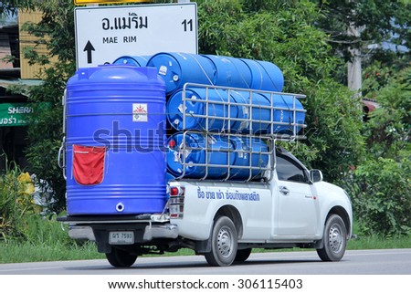 CHIANGMAI, THAILAND -AUGUST 8 2015: Private Pick up car for Water Tank Transportation. Photo at road no 121 about 8 km from downtown Chiangmai, thailand.