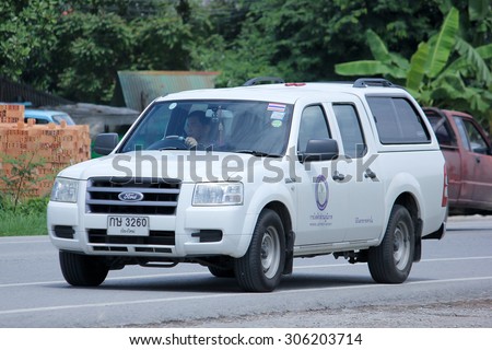 CHIANGMAI, THAILAND -AUGUST 8 2015:  Pick up truck car of Provincial eletricity Authority of Thailands. Photo at road no.1001 about 8 km from downtown Chiangmai, thailand.