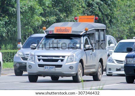 CHIANGMAI, THAILAND -AUGUST 8 2015:  Private School pick up truck. Photo at road no.121 about 8 km from downtown Chiangmai, thailand.