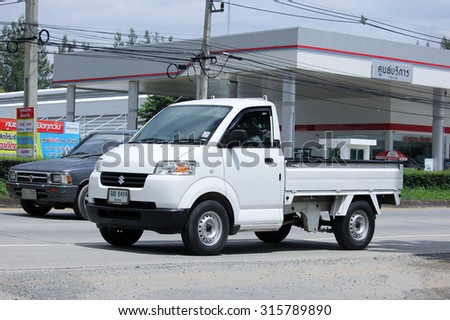 CHIANGMAI, THAILAND -AUGUST 14 2015:  Private Pick up Truck, Suzuki Carry. Photo at road no 121 about 8 km from downtown Chiangmai, thailand.