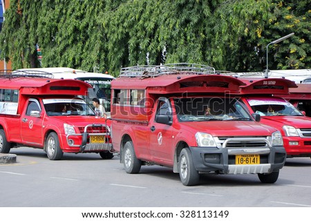 CHIANGMAI, THAILAND -SEPTEMBER 30 2015:  Red taxi Chiang Mai, For Passenger from Bus Station to City Center. Photo at Chiangmai bus station, thailand.