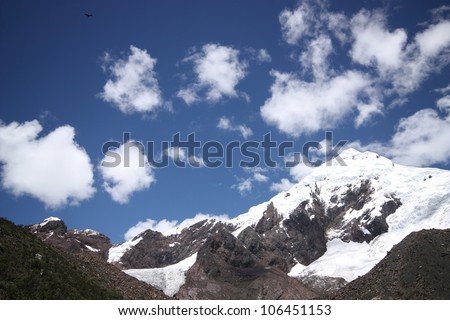 Colorful horizon of magnificent mountains and blue sky with clouds in National Park Huascaran, Huaraz, Peru, south America.