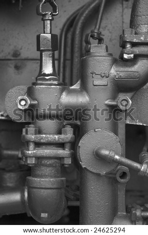 Detail image of piping on a steam locomotive.