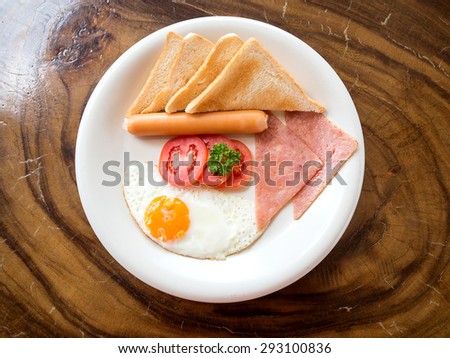 Top view of Breakfast Eggs Ham bread and hot dog