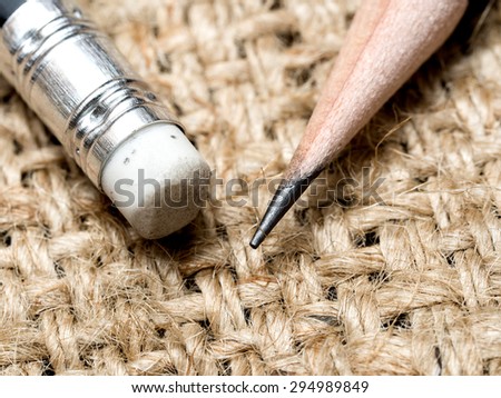 Close up pencil eraser on sand bag