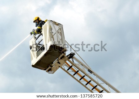 Fireman working a fire stairs car