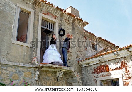 Bride and groom performing in a different wedding scene