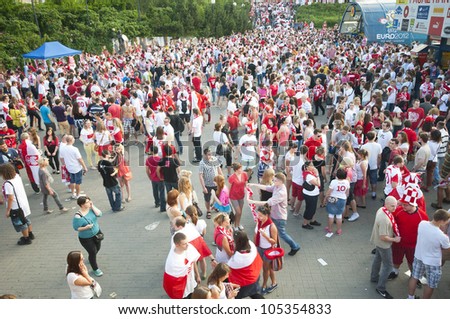 WARSAW, POLAND - JUNE 16, 2012: Polish fans at Warsaw streets before UEFA EURO 2012 Poland vs. Czech Republic football match, June 16, 2012 in Warsaw, Poland