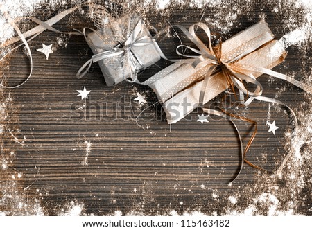 Vintage holidays gifts with packaging paper and atlas bows/vintage selebration background with grunge texsture/christmas background