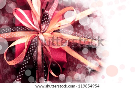 christmas background/ Holidays present with bow from atlas ribbon/ Romantic holidays gift