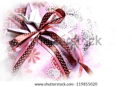 Holidays background/ Holidays present with bow from atlas ribbon/ Romantic valentin days gift