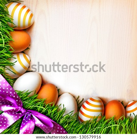 Easter eggs on the grass Background with easter eggs and green grass Easter eggs on the grass Background with easter eggs and green grass
