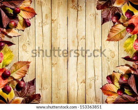Autumn Border From Apples And Fallen Leaves On Old Wooden Table/Thanksgiving Day Concept/Background With Apples
