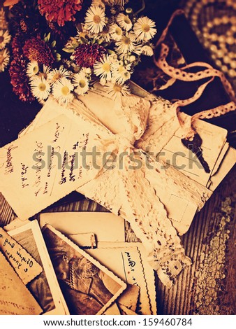 old lettersand  post cards. nostalgic vintage background/ Vintage Letters,Photos of Memories, toned image