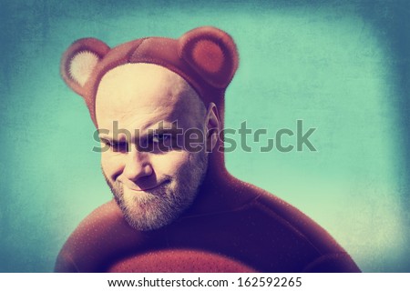Funny man in a bear suit. Vintage advertising concept