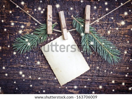 Christmas rustic decoration on textured wooden background