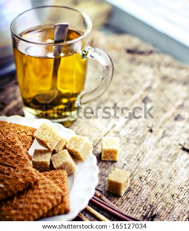 a cup of green tea with cookies/ breakfast background