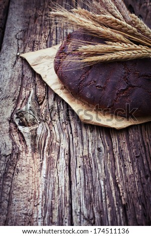 Close-up of traditional bread/ Freshly baked traditional bread on wooden table/