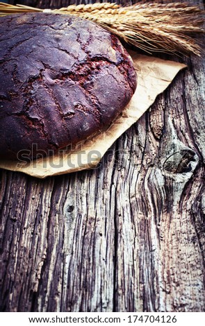 Close-up of traditional bread/ Freshly baked traditional bread on wooden table/