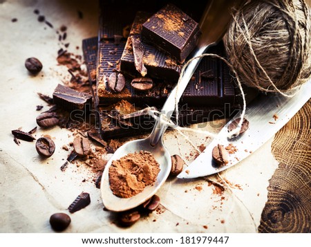 Closeup of Cocoa Powder and Dark Chocolate/ Chopped chocolate with cocoa