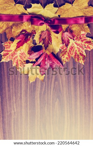 Vintage Autumn bunch from leaves on old wooden table/  Thanksgiving day concept