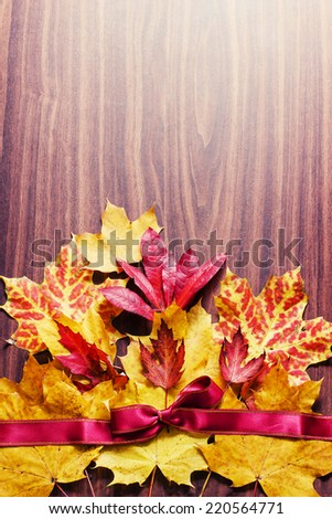 Vintage Autumn bunch from leaves on old wooden table/ Thanksgiving day concept